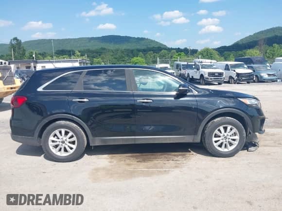 2019 Kia Sorento L with VIN 5XYPG4A34KG560479, listed as a IAAI auction lot 42571939 with 68,924 mi miles and . Bid and sale history available at DreamBid. Image 14.