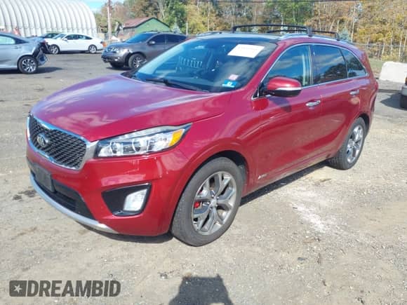 2016 Kia Sorento SXL with VIN 5XYPKDA50GG169305, listed as a IAAI auction lot 43435191 with 123,949 mi miles and . Bid and sale history available at DreamBid. Image 2.
