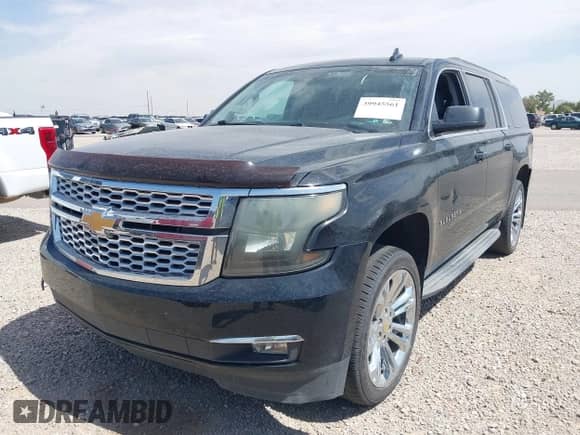 2015 Chevrolet Suburban LT z VIN 1GNSKJKC5FR543579, wystawiony jako IAAI lot #39945561 z przebiegiem 148 453 mil mil oraz . Historia ofert i sprzedaży dostępna na DreamBid. Obrazek 17.
