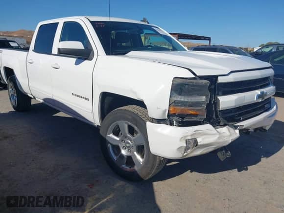 2018 Chevrolet Silverado 1500 LT with VIN 1GCUKRECXJF180945, listed as a IAAI auction lot 42450588 with 108,199 mi miles and . Bid and sale history available at DreamBid. Image 1.