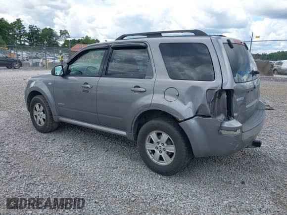 2008 Mercury Mariner with VIN 4M2CU91178KJ14388, listed as a IAAI auction lot 42973382 with 219,954 mi miles and . Bid and sale history available at DreamBid. Image 3.