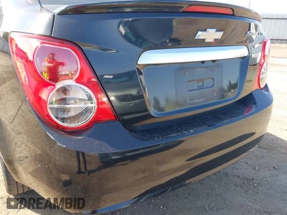 2014 Chevrolet Sonic LTZ with VIN 1G1JE5SB4E4181114, listed as a IAAI auction lot 42396726 with 119,660 mi miles and . Bid and sale history available at DreamBid. Image 14.
