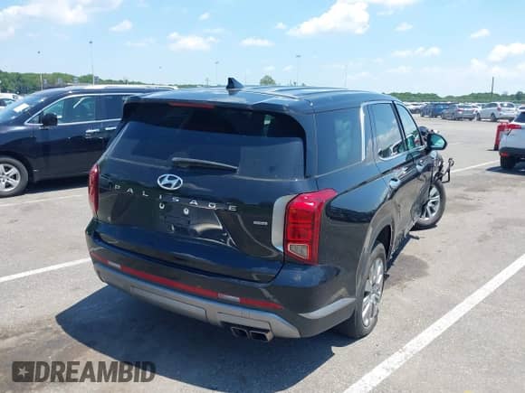 2023 Hyundai Palisade SE z VIN KM8R1DGE8PU504341, wystawiony jako IAAI lot #42582476 z przebiegiem 41 249 mil mil oraz . Historia ofert i sprzedaży dostępna na DreamBid. Obrazek 4.