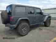 2023 Jeep Wrangler Rubicon 20th Anniversary with VIN 1C4JJXSJ4PW546713, listed as a Copart auction lot 68812855 with 19,897 mi miles and Salvage title. Bid and sale history available at DreamBid. Image 3.