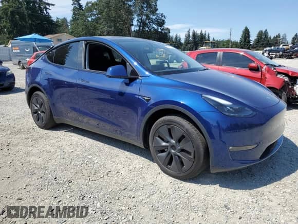 2024 Tesla Model Y Long Range with VIN 7SAYGDEEXRF129763, listed as a Copart auction lot 70710374 with 333 mi miles and Salvage title. Bid and sale history available at DreamBid. Image 4.