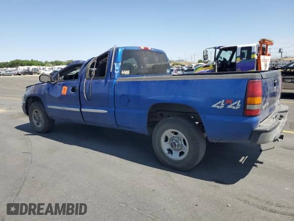 2003 GMC Sierra 1500 SLE with VIN 2GTEK19T331153158, listed as a Copart auction lot 62517265 with 14,673 mi miles and Salvage title. Bid and sale history available at DreamBid. Image 2.