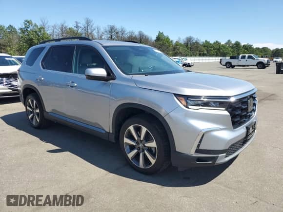 2024 Honda Pilot Touring with VIN 5FNYG1H74RB016366, listed as a Copart auction lot 64484215 with 24,788 mi miles and Salvage title. Bid and sale history available at DreamBid. Image 4.