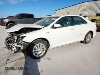 2012 Toyota Camry XLE with VIN 4T1BD1FK4CU016013, listed as a Copart auction lot 85202975 with 122,744 mi miles and Salvage title. Bid and sale history available at DreamBid. Image 1.