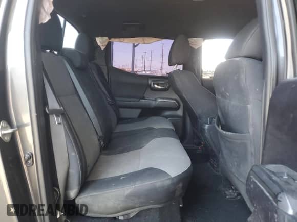 2020 Toyota Tacoma SR5 с VIN 3TMBZ5DN4LM024014, выставлен на аукционе Copart как лот 58260065 с пробегом 145 836 миль миль и Списание • Salvage title. История ставок и продаж доступна на DreamBid. Изображение 10.
