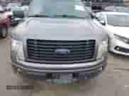 2014 Ford F-150 XL with VIN 1FTFW1CF9EKF88068, listed as a IAAI auction lot 41267682 with 119,281 mi miles and . Bid and sale history available at DreamBid. Image 13.