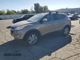 2012 Hyundai Tucson Limited с VIN KM8JUCAC5CU544618, выставлен на аукционе Copart как лот 83836795 с пробегом 141 381 миль миль и Списание • Salvage title. История ставок и продаж доступна на DreamBid. Изображение 1.
