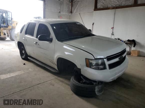 2013 Chevrolet Tahoe Commercial with VIN 1GNLC2E00DR159926, listed as a Copart auction lot 86714345 with 193,514 mi miles and Salvage title. Bid and sale history available at DreamBid. Image 4.