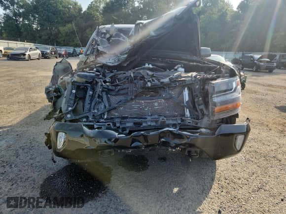 2017 Chevrolet Silverado 1500 LT z VIN 3GCUKREC6HG192230, wystawiony jako Copart lot #70720235 z przebiegiem Nie podano mil oraz Szkoda całkowita • Salvage title. Historia ofert i sprzedaży dostępna na DreamBid. Obrazek 5.