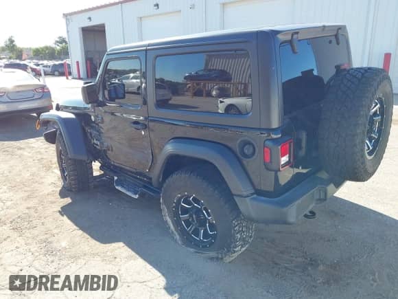 2019 Jeep Wrangler Sport S with VIN 1C4GJXAG9KW583300, listed as a IAAI auction lot 43061781 with 55,543 mi miles and . Bid and sale history available at DreamBid. Image 3.