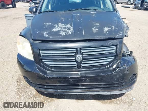 2008 Dodge Caliber SE with VIN 1B3HB28B38D634861, listed as a IAAI auction lot 42569234 with 159,849 mi miles and . Bid and sale history available at DreamBid. Image 12.