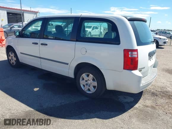 2010 Dodge Grand Caravan Cargo with VIN 2D4CN1AE1AR205898, listed as a IAAI auction lot 43157452 with 81,297 mi miles and . Bid and sale history available at DreamBid. Image 3.