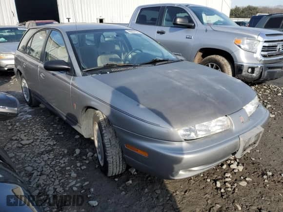 1997 Saturn SW with VIN 1G8ZK8276VZ397575, listed as a Copart auction lot 86637614 with 119,683 mi miles and Salvage title. Bid and sale history available at DreamBid. Image 4.