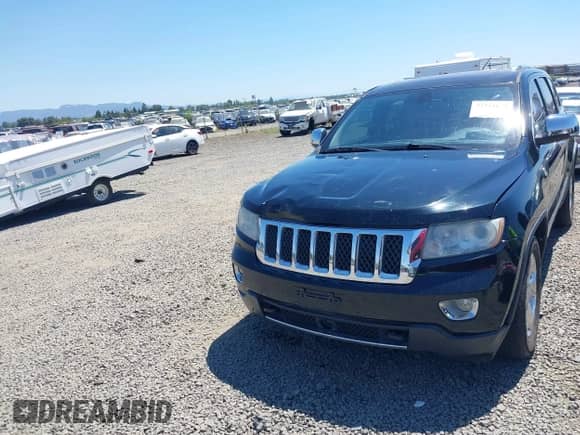 2012 Jeep Grand Cherokee Overland Summit z VIN 1C4RJFCT8CC274935, wystawiony jako IAAI lot #42711029 z przebiegiem 157 680 mil mil oraz . Historia ofert i sprzedaży dostępna na DreamBid. Obrazek 12.