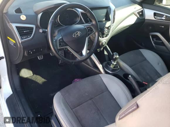 2013 Hyundai Veloster w/Gray Int z VIN KMHTC6AD3DU171621, wystawiony jako Copart lot #80663404 z przebiegiem Nie podano mil oraz Czysty tytuł • Clean title. Historia ofert i sprzedaży dostępna na DreamBid. Obrazek 8.