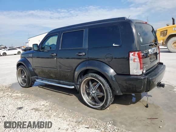 2007 Dodge Nitro SLT с VIN 1D8GT58K17W736432, выставлен на аукционе Copart как лот 84244375 с пробегом 203 027 миль миль и Списание • Salvage title. История ставок и продаж доступна на DreamBid. Изображение 2.