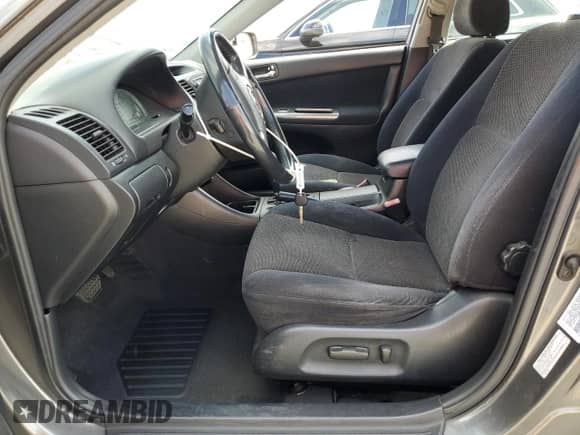 2002 Toyota Camry XLE with VIN 4T1BF32K62U520508, listed as a Copart auction lot 81731375 with 163,519 mi miles and Salvage title. Bid and sale history available at DreamBid. Image 7.