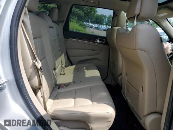 2013 Jeep Grand Cherokee Limited z VIN 1C4RJFBG5DC636189, wystawiony jako Copart lot #64136425 z przebiegiem 108 082 mil mil oraz Szkoda całkowita • Salvage title. Historia ofert i sprzedaży dostępna na DreamBid. Obrazek 11.