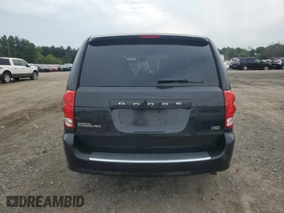 2013 Dodge Grand Caravan SE with VIN 2C4RDGBGXDR664087, listed as a Copart auction lot 84648465 with 142,167 mi miles and Clean title. Bid and sale history available at DreamBid. Image 6.