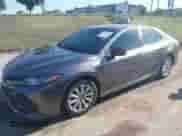 2020 Toyota Camry LE with VIN 4T1C11AK9LU391108, listed as a IAAI auction lot 43087805 with 88,386 mi miles and . Bid and sale history available at DreamBid. Image 2.