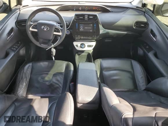 2016 Toyota Prius Two z VIN JTDKBRFUXG3023201, wystawiony jako Copart lot #82238595 z przebiegiem 253 588 mil mil oraz Szkoda całkowita • Salvage title. Historia ofert i sprzedaży dostępna na DreamBid. Obrazek 8.