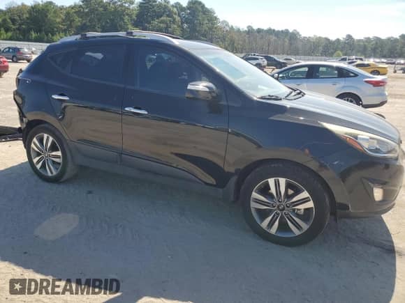 2014 Hyundai Tucson Limited with VIN KM8JU3AG8EU941956, listed as a Copart auction lot 70670355 with 87,256 mi miles and Salvage title. Bid and sale history available at DreamBid. Image 4.