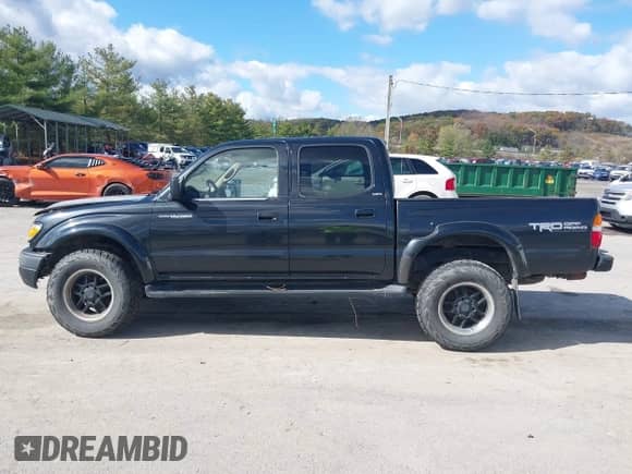 2003 Toyota Tacoma z VIN 5TEHN72N53Z249453, wystawiony jako IAAI lot #43472155 z przebiegiem 162 053 mil mil oraz . Historia ofert i sprzedaży dostępna na DreamBid. Obrazek 14.