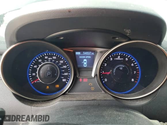 2013 Hyundai Genesis Coupe Track with VIN KMHHU6KJ0DU103199, listed as a Copart auction lot 71637134 with 54,837 mi miles and Salvage title. Bid and sale history available at DreamBid. Image 9.