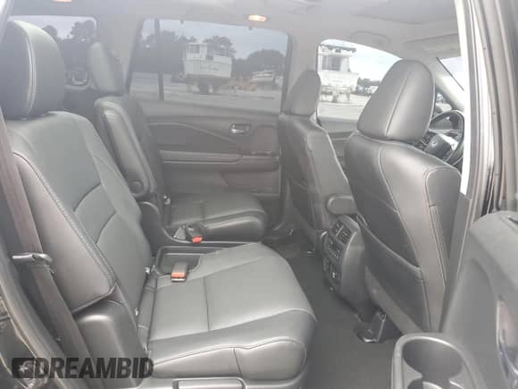 2021 Honda Pilot Elite с VIN 5FNYF6H0XMB023270, выставлен на аукционе Copart как лот 67741735 с пробегом 99 437 миль миль и Списание • Salvage title. История ставок и продаж доступна на DreamBid. Изображение 11.