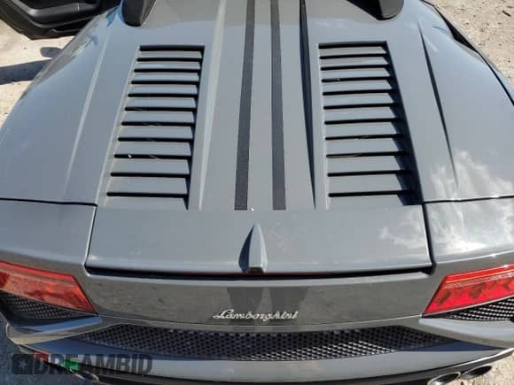 2013 Lamborghini Gallardo с VIN ZHWGU6AU7DLA12927, выставлен на аукционе Copart как лот 55624325 с пробегом 34 760 миль миль и Списание • Salvage title. История ставок и продаж доступна на DreamBid. Изображение 11.
