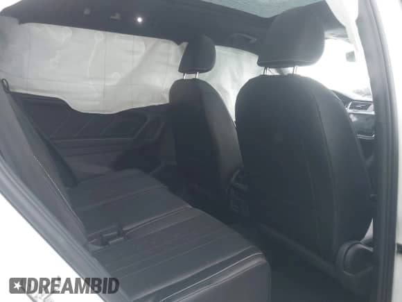 2022 Volkswagen Tiguan SE R-Line Black с VIN 3VV8B7AX6NM027050, выставлен на аукционе IAAI как лот 42463714 с пробегом 45 303 миль миль и . История ставок и продаж доступна на DreamBid. Изображение 8.