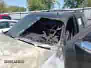 2014 Chevrolet Tahoe LTZ z VIN 1GNSKCE09ER100007, wystawiony jako IAAI lot #43163852 z przebiegiem 115 817 mil mil oraz . Historia ofert i sprzedaży dostępna na DreamBid. Obrazek 13.