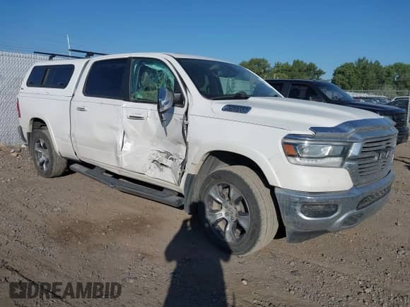 2019 Ram 1500 Laramie with VIN 1C6SRFRT1KN648538, listed as a IAAI auction lot 43009904 with 181,229 mi miles and . Bid and sale history available at DreamBid. Image 1.