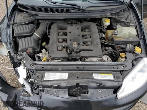 2004 Dodge Intrepid ES z VIN 2B3HD56M64H635094, wystawiony jako Copart lot #59017465 z przebiegiem 122 613 mil mil oraz Szkoda całkowita • Salvage title. Historia ofert i sprzedaży dostępna na DreamBid. Obrazek 11.