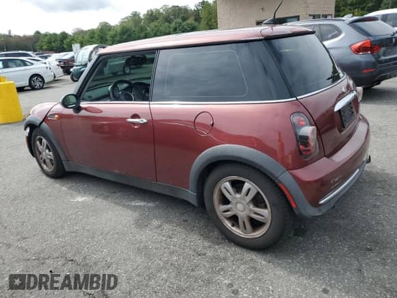 2006 MINI Hardtop with VIN WMWRC33526TK66647, listed as a Copart auction lot 81100025 with 179,203 mi miles and Salvage title. Bid and sale history available at DreamBid. Image 2.