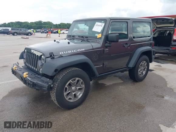 2014 Jeep Wrangler Rubicon with VIN 1C4BJWCG3EL221499, listed as a IAAI auction lot 42541878 with 43,757 mi miles and . Bid and sale history available at DreamBid. Image 2.