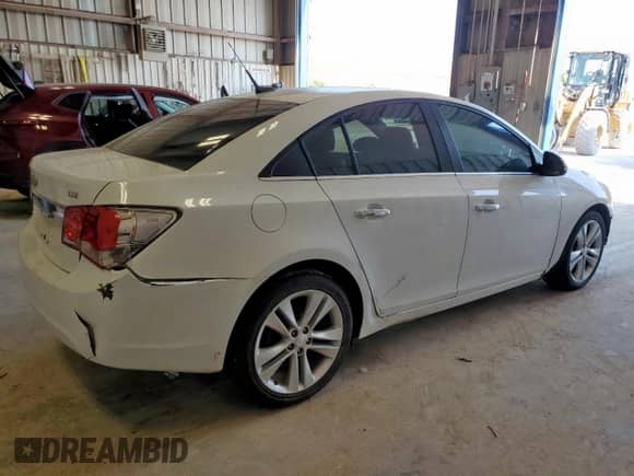 2014 Chevrolet Cruze LTZ с VIN 1G1PG5SB2E7242124, выставлен на аукционе Copart как лот 58045115 с пробегом 156 378 миль миль и Списание • Salvage title. История ставок и продаж доступна на DreamBid. Изображение 3.
