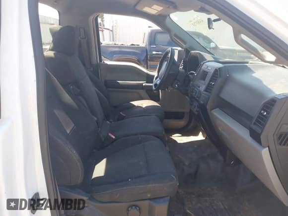 2019 Ford F-150 XL with VIN 1FTMF1C58KKD60301, listed as a IAAI auction lot 43080733 with 128,826 mi miles and . Bid and sale history available at DreamBid. Image 5.