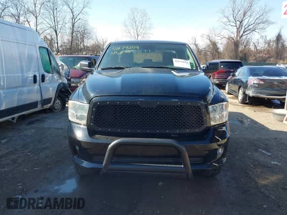 2013 Ram 1500 Tradesman z VIN 1C6RR7FT4DS645906, wystawiony jako IAAI lot #41679254 z przebiegiem 123 409 mil mil oraz . Historia ofert i sprzedaży dostępna na DreamBid. Obrazek 12.