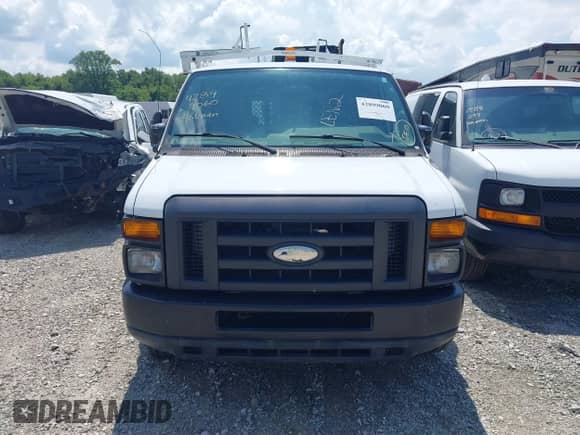 2014 Ford Econoline Cargo Commercial with VIN 1FTNE1EW6EDA98557, listed as a IAAI auction lot 42899060 with 100,627 mi miles and . Bid and sale history available at DreamBid. Image 12.