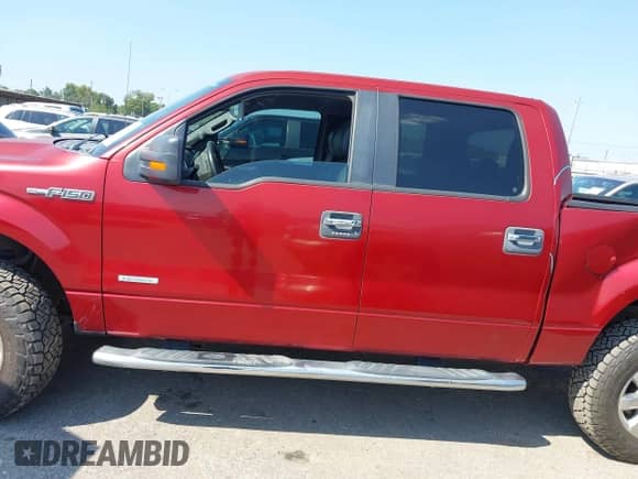 2013 Ford F-150 Lariat with VIN 1FTFW1ET5DKD59128, listed as a IAAI auction lot 43185916 with 135,162 mi miles and . Bid and sale history available at DreamBid. Image 14.