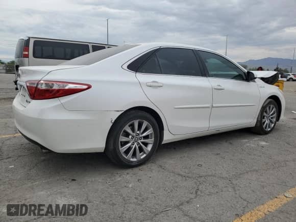 2015 Toyota Camry LE с VIN 4T1BD1FKXFU167796, выставлен на аукционе Copart как лот 70953095 с пробегом 128 819 миль миль и Списание • Salvage title. История ставок и продаж доступна на DreamBid. Изображение 3.