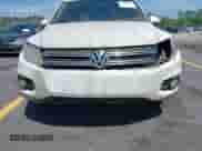 2015 Volkswagen Tiguan S with VIN WVGAV7AX4FW506314, listed as a IAAI auction lot 42063584 with 143,939 mi miles and . Bid and sale history available at DreamBid. Image 6.