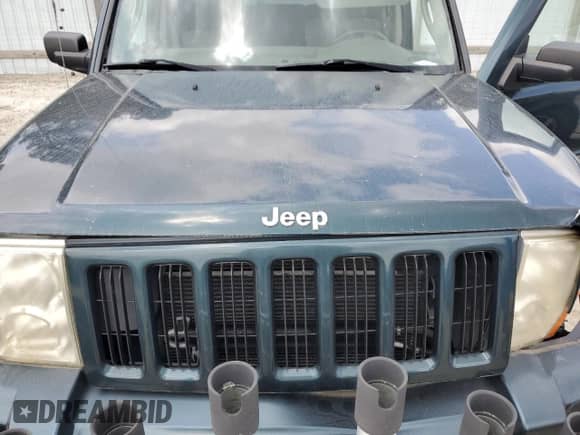 2006 Jeep Commander z VIN 1J8HG48K56C104463, wystawiony jako Copart lot #67740515 z przebiegiem 100 019 mil mil oraz Szkoda całkowita • Salvage title. Historia ofert i sprzedaży dostępna na DreamBid. Obrazek 12.
