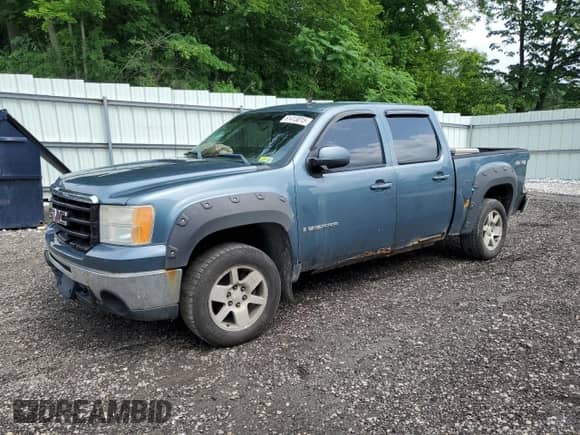 2009 GMC Sierra 1500 SLT with VIN 3GTEK33389G203475, listed as a Copart auction lot 61413015 with 170,321 mi miles and Salvage title. Bid and sale history available at DreamBid. Image 1.