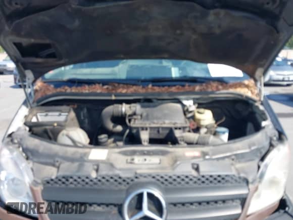 2007 Dodge Sprinter with VIN WD0PE745775163148, listed as a IAAI auction lot 42443845 with 389,024 mi miles and . Bid and sale history available at DreamBid. Image 10.